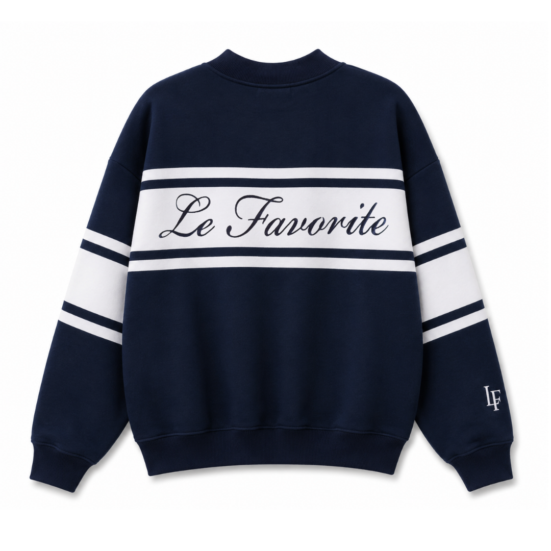 Navy blue sweatshirt with white stripes and 'Le Favorite' text on a white background