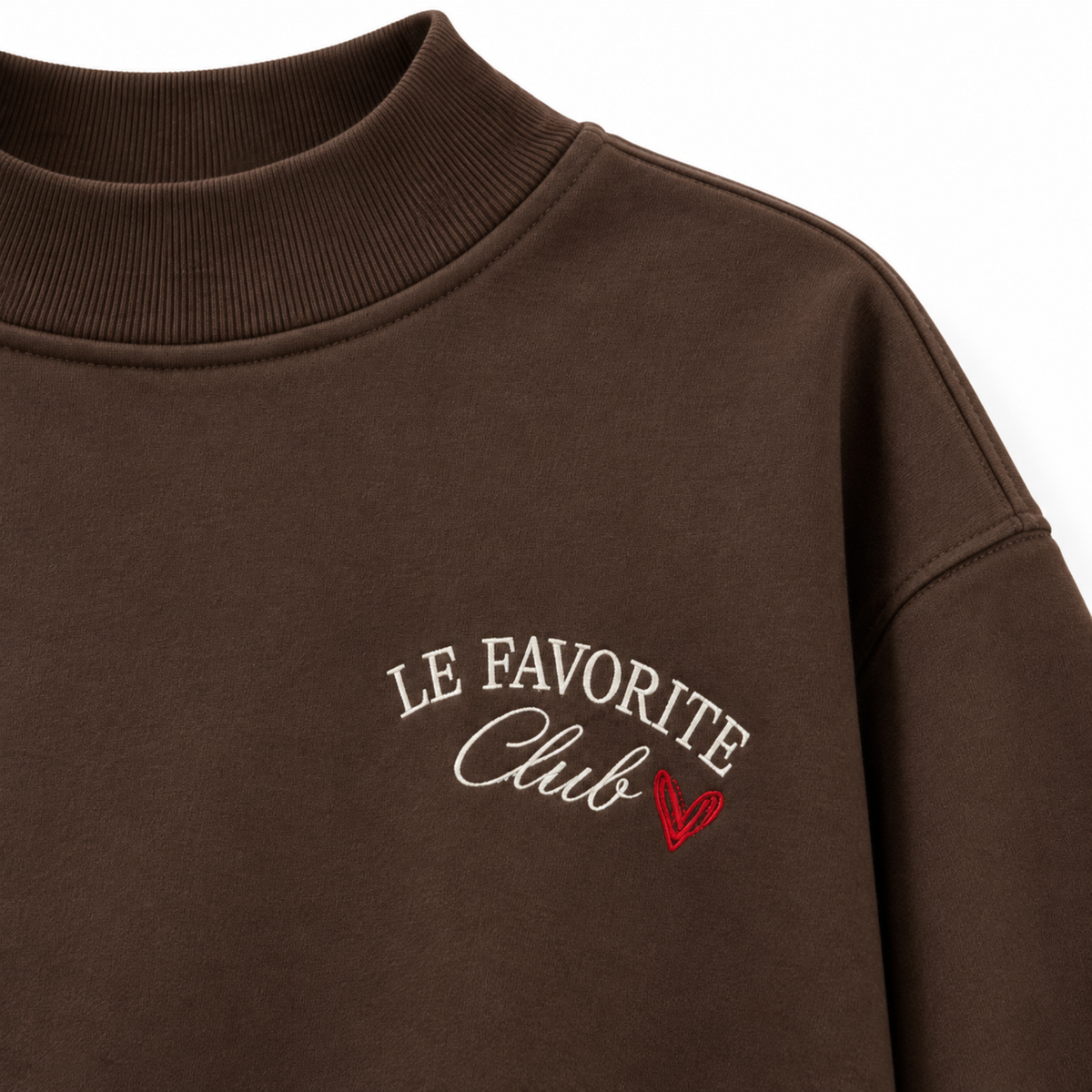 Black sweater with embroidered lightning bolt designs on a white background