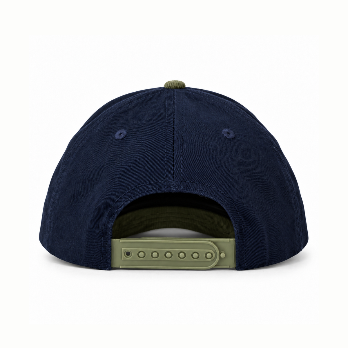 The back view of a navy blue snapback cap with an olive green adjustable strap and matching green button on a white background.